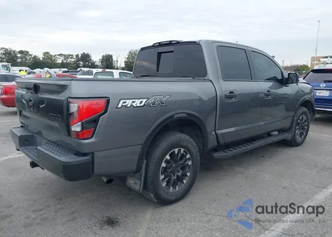 2021 Nissan Titan Pro-4X 4X4 z USA, uszkodzony, nr VIN 1N6AA1ED1MN526145